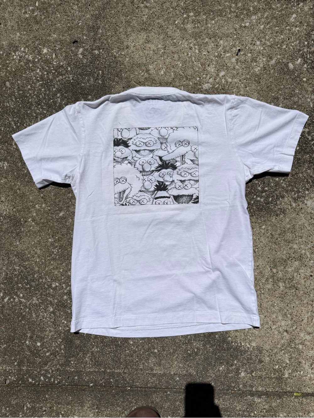 White KAWS x Uniqlo x Sesame Street XX
Pocket Tee